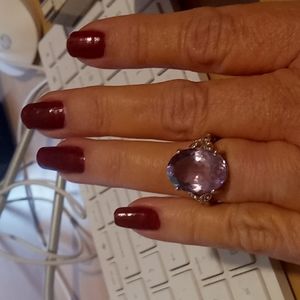 925 sterling  solid silver ring light amethyst size 7 diamonique on the side.